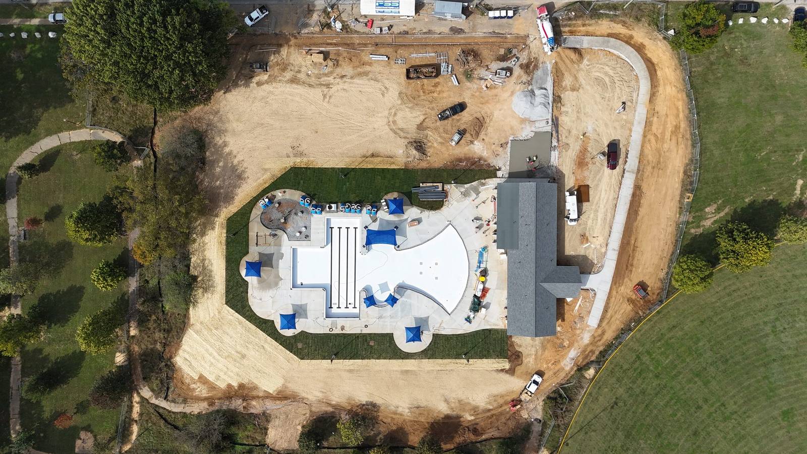 Camp Taylor waterpark with water, slide, lap lanes, and zero-depth entry, October 2025