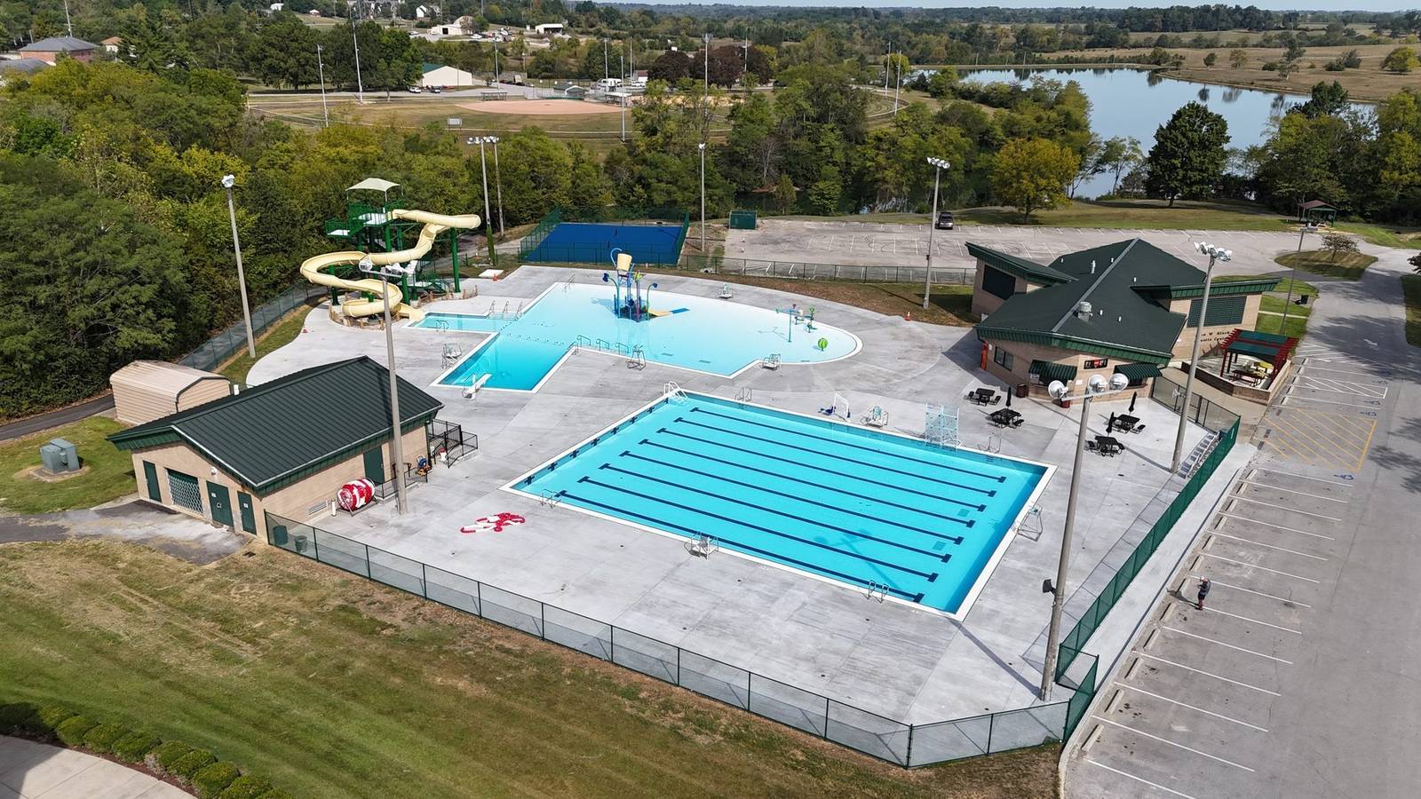 Closer aerial of the John W. Black main pool, water slide, and shade structures
